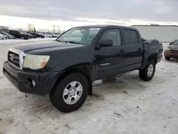 Salvage cars for sale from Copart Rocky View County, AB: 2005 Toyota Tacoma Double Cab