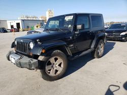 Salvage cars for sale at New Orleans, LA auction: 2009 Jeep Wrangler Sahara