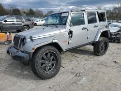 Jeep Wrangler Unlimited Sahara salvage cars for sale: 2014 Jeep Wrangler Unlimited Sahara