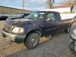 Salvage trucks for sale at Lexington, KY auction: 2000 Ford F150