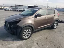 Salvage SUVs for sale at auction: 2015 KIA Sportage LX