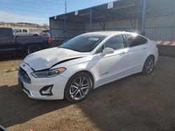 Salvage cars for sale at Colorado Springs, CO auction: 2019 Ford Fusion Titanium