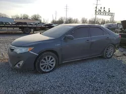 Toyota salvage cars for sale: 2012 Toyota Camry Hybrid