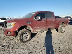 Salvage trucks for sale at Earlington, KY auction: 2016 Nissan Titan XD SL