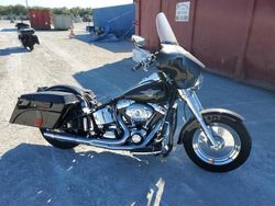 Motos dañados por inundaciones a la venta en subasta: 2004 Harley-Davidson Flstfi