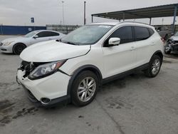 Nissan salvage cars for sale: 2019 Nissan Rogue Sport S