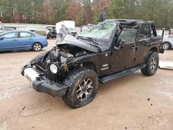 Salvage cars for sale at Charles City, VA auction: 2012 Jeep Wrangler Unlimited Sahara