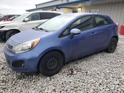 Salvage cars for sale from Copart Wayland, MI: 2013 KIA Rio EX