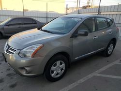 Salvage cars for sale from Copart Sun Valley, CA: 2011 Nissan Rogue S