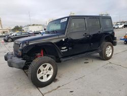 Salvage cars for sale at New Orleans, LA auction: 2011 Jeep Wrangler Unlimited Sahara