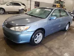 Salvage cars for sale from Copart Avon, MN: 2002 Toyota Camry LE