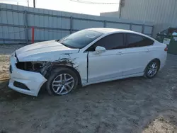 Salvage cars for sale at Jacksonville, FL auction: 2013 Ford Fusion SE