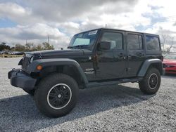 Salvage cars for sale at Riverview, FL auction: 2011 Jeep Wrangler Unlimited Sport