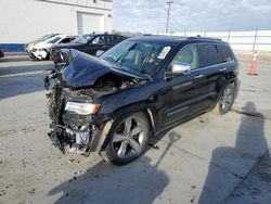 Jeep Grand Cherokee salvage cars for sale: 2014 Jeep Grand Cherokee Overland