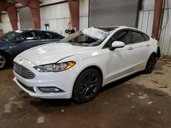 Salvage cars for sale at Lansing, MI auction: 2018 Ford Fusion SE