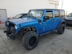 Salvage cars for sale at Farr West, UT auction: 2015 Jeep Wrangler Unlimited Sport