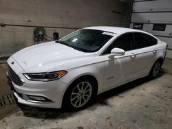 Salvage cars for sale from Copart Blaine, MN: 2017 Ford Fusion SE Hybrid