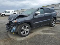 Salvage cars for sale at Bakersfield, CA auction: 2014 Jeep Grand Cherokee Overland