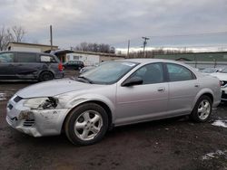 Salvage vehicles for parts for sale at auction: 2004 Dodge Stratus SXT