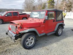 Salvage SUVs for sale at auction: 1999 Jeep Wrangler / TJ SE