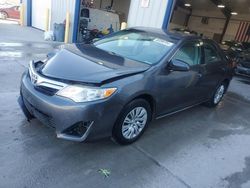 Salvage cars for sale at auction: 2013 Toyota Camry L