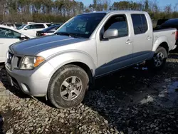 Salvage SUVs for sale at auction: 2012 Nissan Frontier S