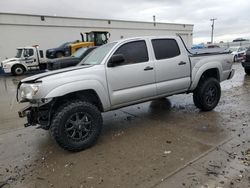 Salvage trucks for sale at Farr West, UT auction: 2010 Toyota Tacoma Double Cab Prerunner