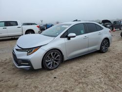 Salvage cars for sale at Houston, TX auction: 2021 Toyota Corolla SE