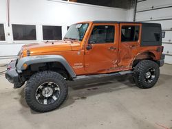 Salvage cars for sale at Blaine, MN auction: 2011 Jeep Wrangler Unlimited Sport