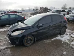 Salvage cars for sale at London, ON auction: 2011 Ford Fiesta SE