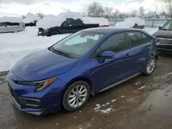 Salvage cars for sale from Copart London, ON: 2021 Toyota Corolla SE