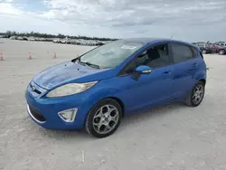 Salvage cars for sale at Arcadia, FL auction: 2011 Ford Fiesta SES