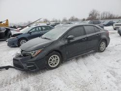 Salvage cars for sale at London, ON auction: 2020 Toyota Corolla SE