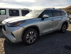 Salvage cars for sale from Copart Colton, CA: 2022 Toyota Highlander Hybrid XLE