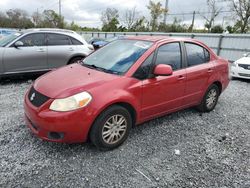 Salvage cars for sale at auction: 2012 Suzuki SX4 LE