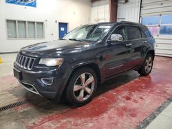 Jeep Grand Cherokee salvage cars for sale: 2014 Jeep Grand Cherokee Overland