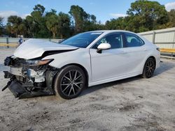 Salvage cars for sale at Fort Pierce, FL auction: 2021 Toyota Camry SE