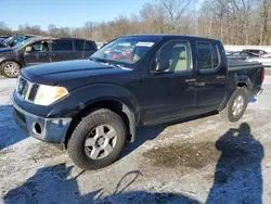 Salvage trucks for sale at Ellwood City, PA auction: 2007 Nissan Frontier Crew Cab LE