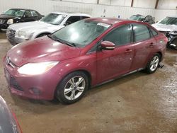 Salvage cars for sale from Copart Lansing, MI: 2014 Ford Focus SE