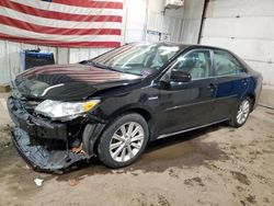 Salvage cars for sale from Copart Cleveland: 2014 Toyota Camry Hybrid