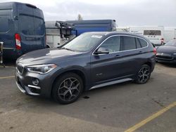 Salvage cars for sale at Hayward, CA auction: 2017 BMW X1 XDRIVE28I