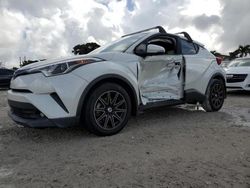 Salvage cars for sale at auction: 2019 Toyota C-HR XLE